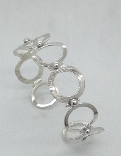 ”Munkar” Öppet armband med ringar i silver. 1250:- SEK
