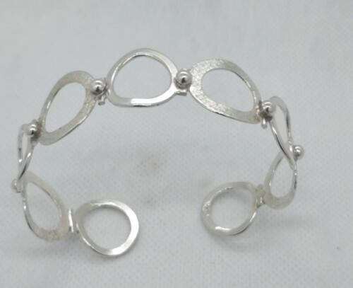 ”Munkar” Öppet armband med ringar i silver. 1250:- SEK